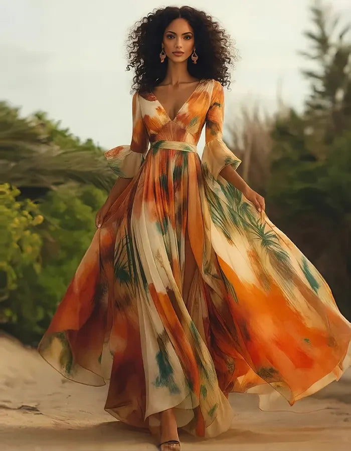Robe en chiffon orange éclatante avec imprimé pictural et manches évasées