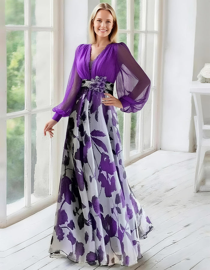 Elegante vestido de noche de gasa azul marino con falda estampada floral y mangas obispo transparentes