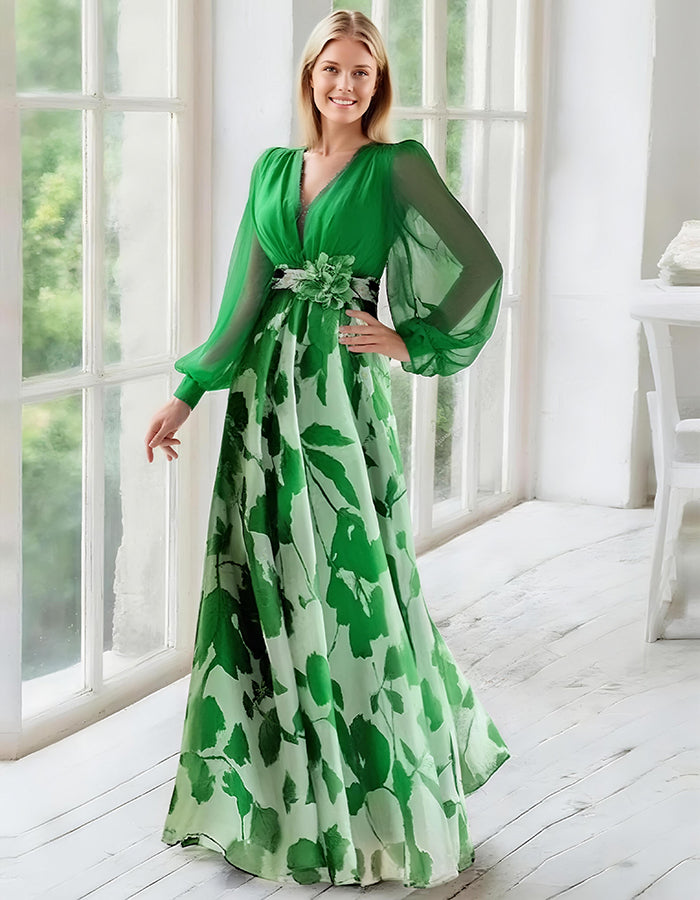 Elegante vestido de noche de gasa azul marino con falda estampada floral y mangas obispo transparentes