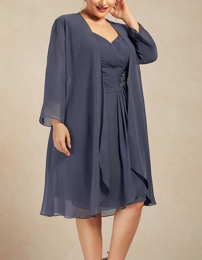 Taille aansluitend chiffon midi-jurk pak