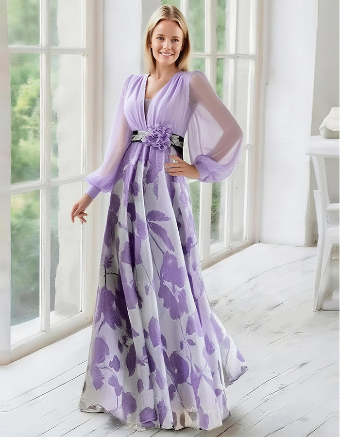 Elegante vestido de noche de gasa azul marino con falda estampada floral y mangas obispo transparentes