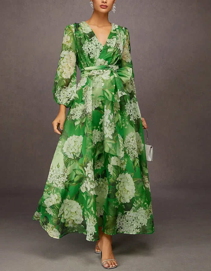 Robe midi verte à fleurs avec décolleté plongeant en V et manches longues