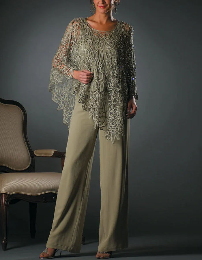Elegante top poncho de encaje con pantalones fluidos de pierna ancha
